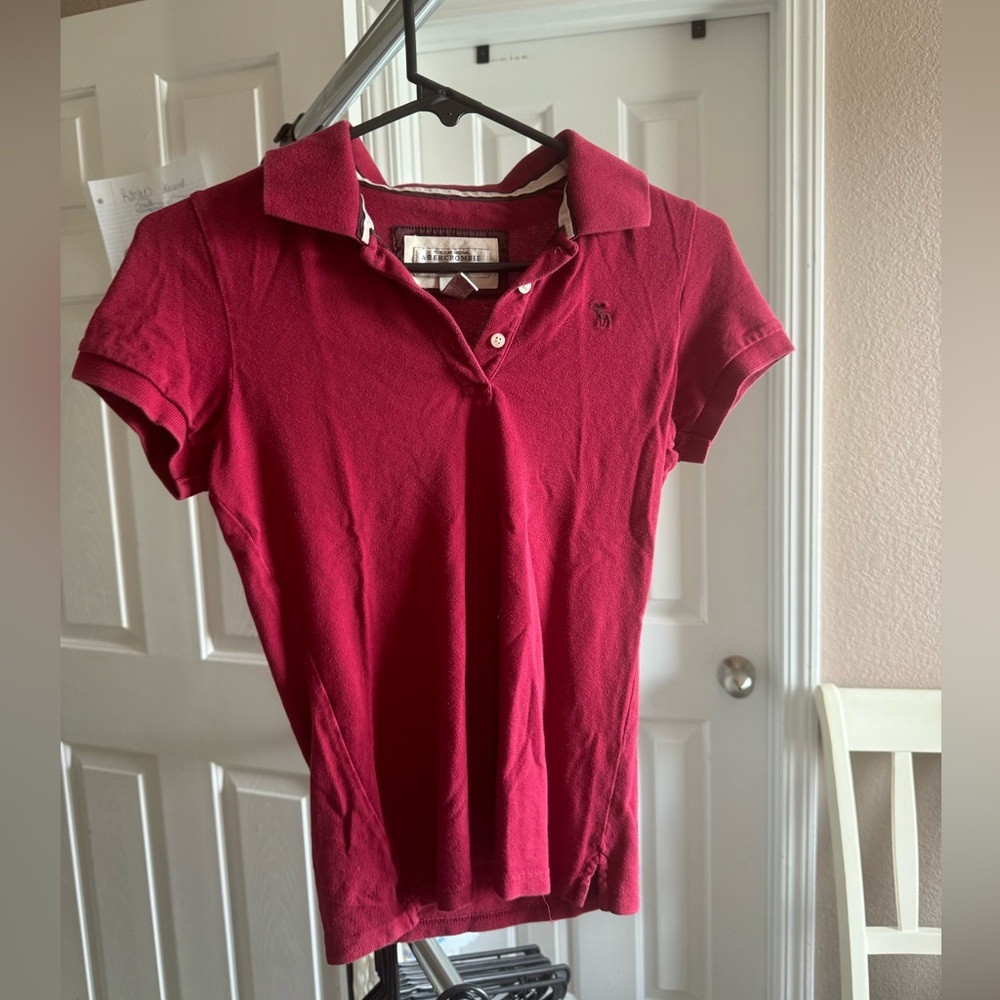 Great condition!  Abercrombie & Fitch Women’s Polo Shirt. Size Medium.